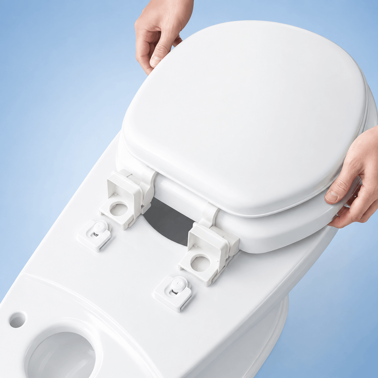 Quick-release toilet seat hinge system for easy bathroom cleaning
