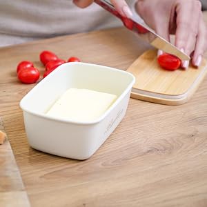 Plexon butter dish and bamboo tray used for food preparation