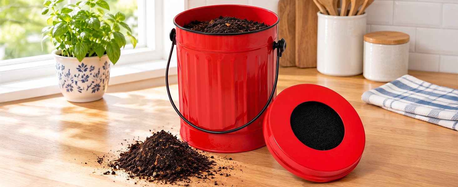 Finished rich compost in red compost bin
