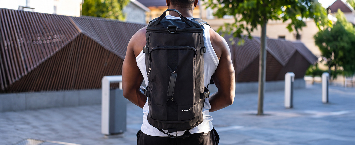 Plexon black duffle backpack worn as a backpack