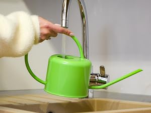 Green watering can with ergonomic handle