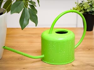 Green steel watering can with modern cylindrical design