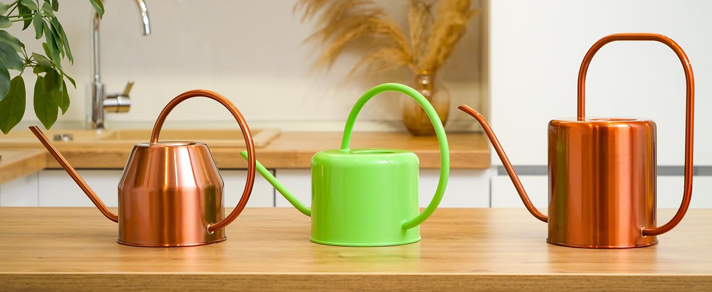 Three Plexon watering cans in different colors
