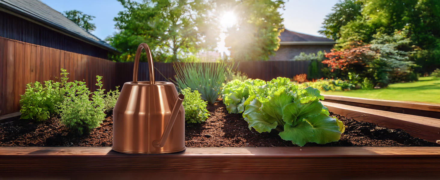 Rose gold watering can in yard, garden and patio setting