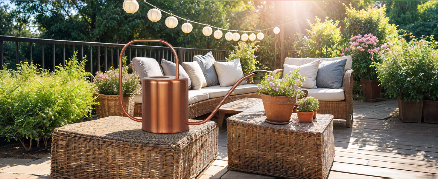 Rose gold watering can on outdoor patio