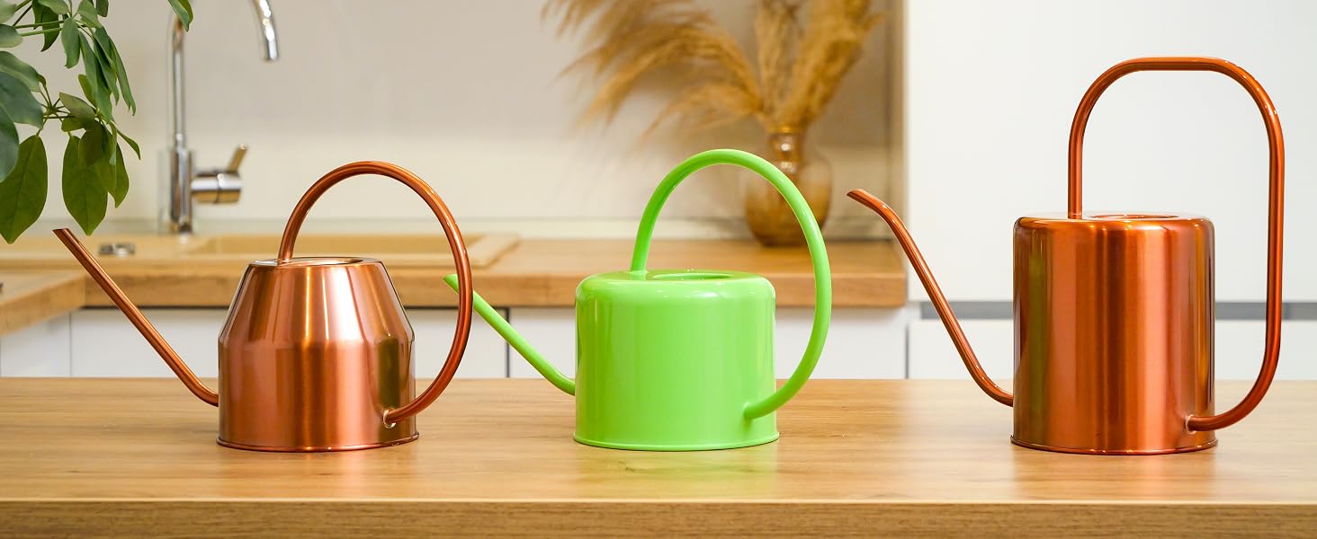 Three Plexon watering cans in different colors